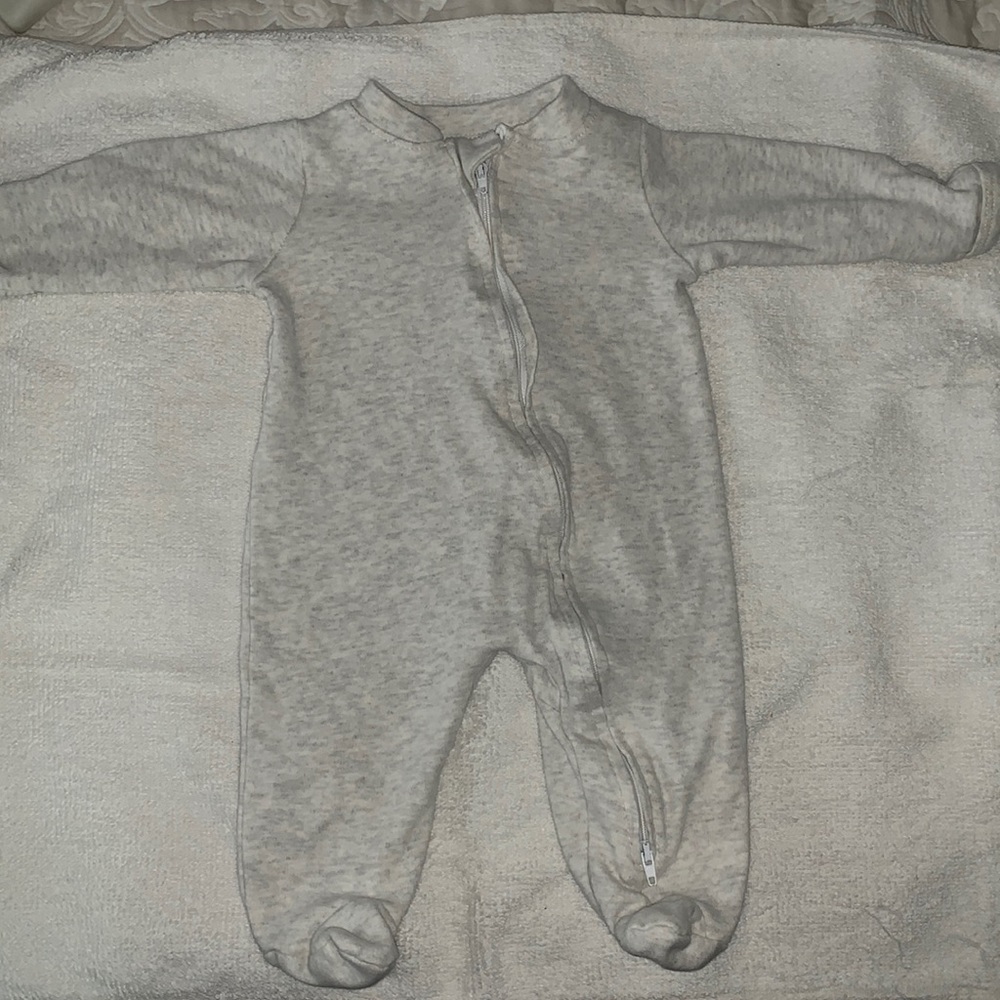 Gently worn  one piece zipper outfit for baby.